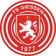 Wappen der TS Giessen 1977: weißer Löwe mit Halbmond und Stern auf rotem Grund